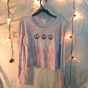 A thin long sleeve crop top purple tie dye